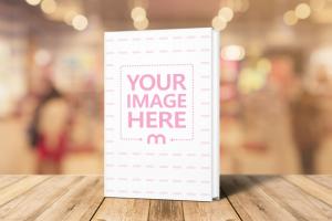 Book Standing on Wood Stage Mockup Generator