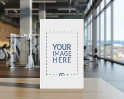 Fitness Book Cover Mockup with Gym Background