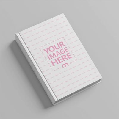 Hardcover Book Mockup Laid on Isolated White Background