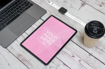 iPad Mockup Next to Macbook and Apple Watch