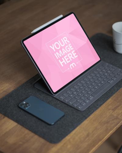iPad on Dark Wooden Desk PSD Mockup 