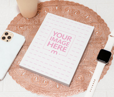 Mockup Featuring a Book Surrounded by Smart Devices