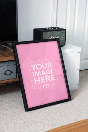 Portrait Photo Frame in Living Room Mockup Generator