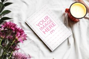 Free Book Cover on Table Mockup Generator