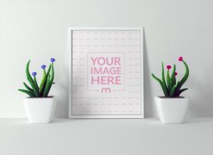 White Photo Frame on Desk Mockup Generator